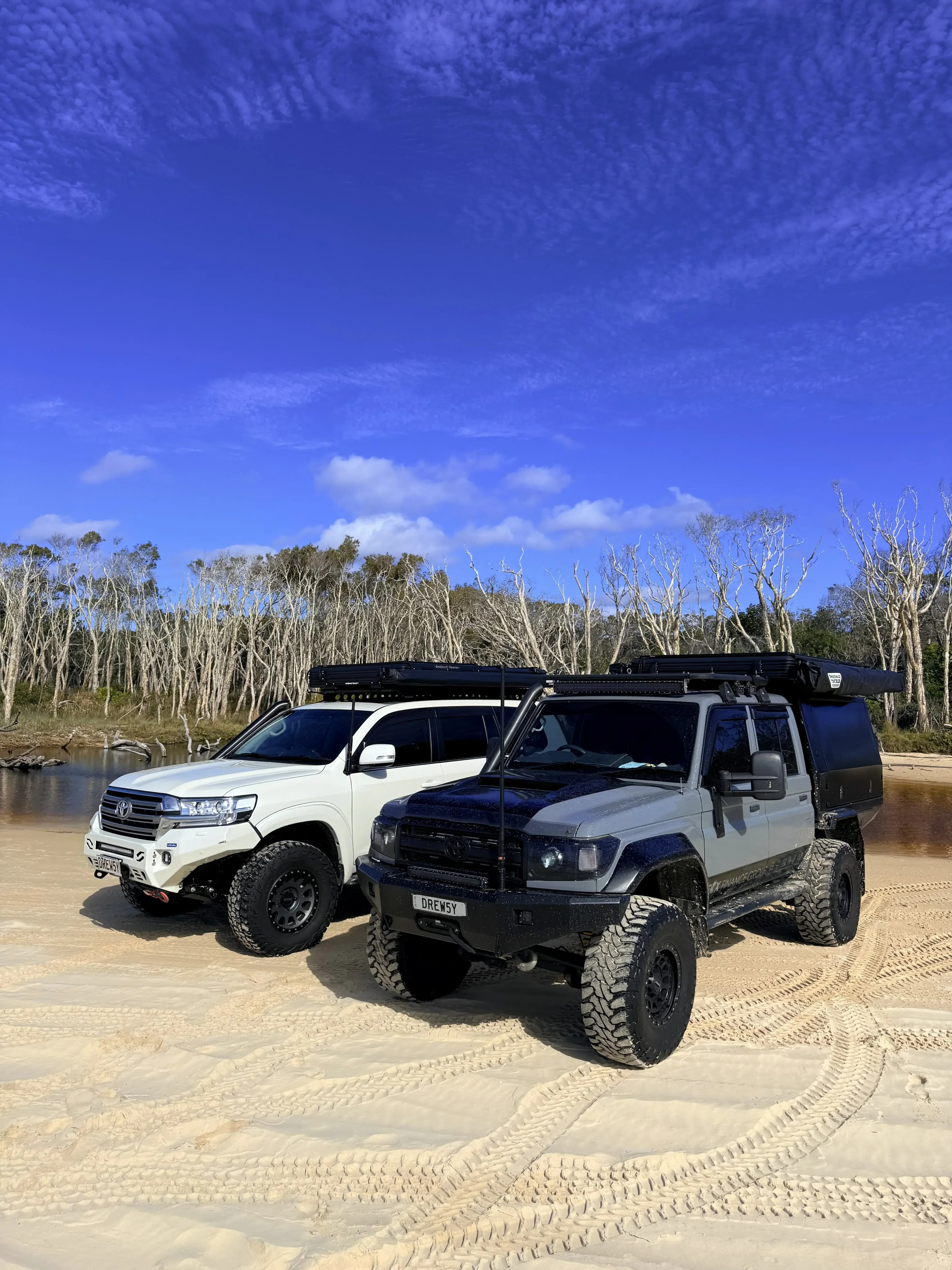 Two 4x4s on the sand at Straddie..